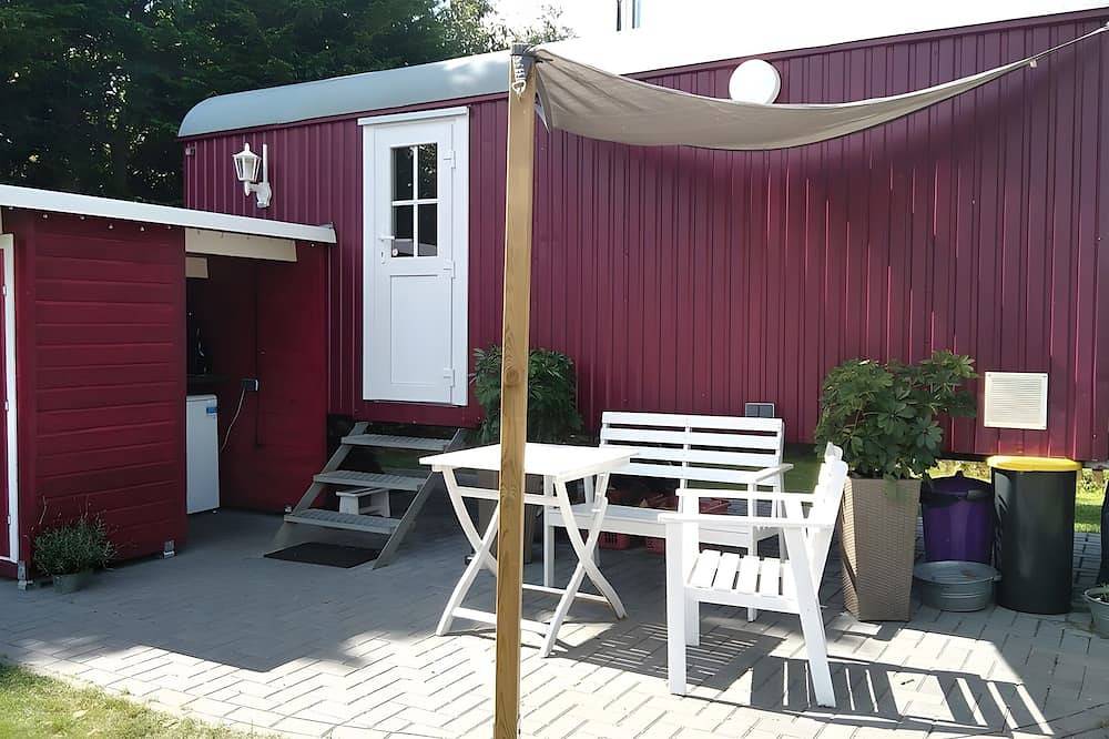 Ferienhaus 'Bauwagen Rhumeblüte' mit privater Terrasse, Garten und Internet in Rüdershausen, Harzvorland