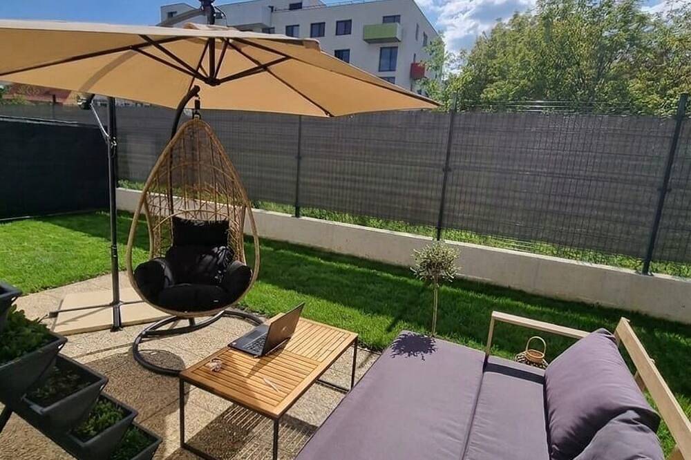 Ganze Wohnung, Garden Residence - Tranquil 2-Bedroom Apartment with private Garden & Ac in Neutraer Landschaftsverband