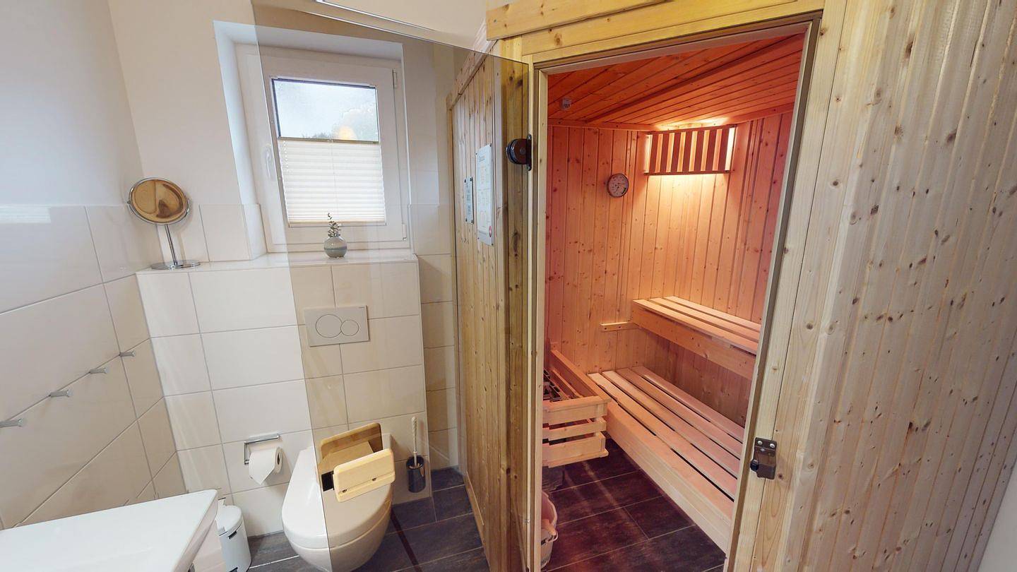 Gemütliches 4-Zimmer-Ferienhaus für 6 Personen mit Kamin & Sauna in Pelzerhaken in Südstrand Pelzerhaken, Ostholstein