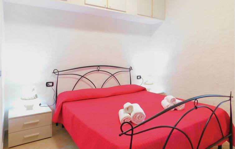 Appartement de vacances entier, Retraite au bord de la piscine : Appartement confortable avec jardin et Internet in Gonnesa, Iglesiente