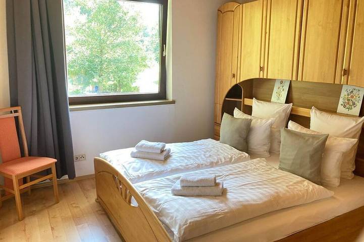 Wohnung mit Balkon, Schlafzimmer, Seeblick 11 - Aparthotel Seebrauer am Afritzer in Feld am See, Villach-Land