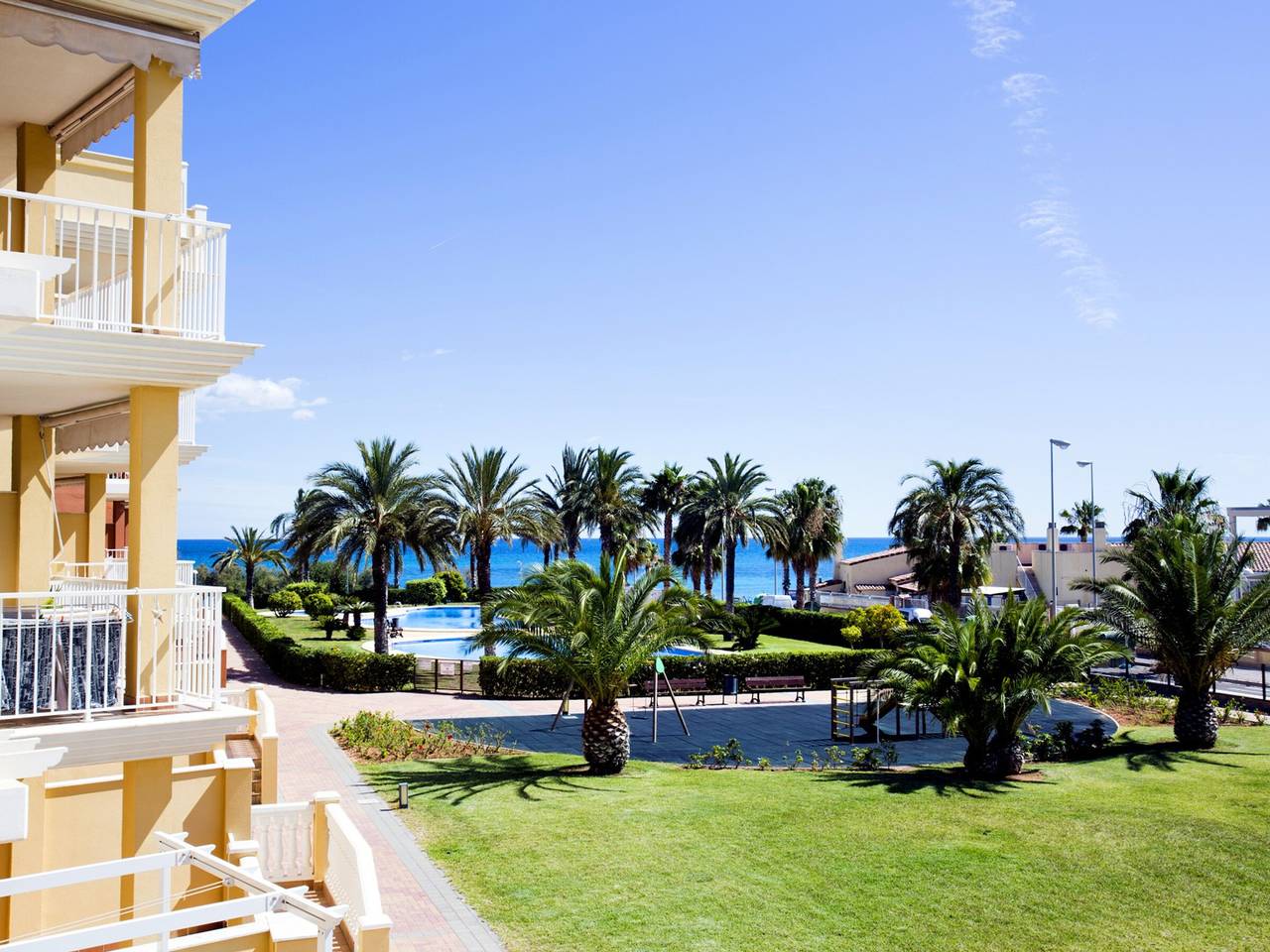 Entire apartment, Beachfront Apartment in Denia with Pool and Parking in Almadrava, Costa Blanca