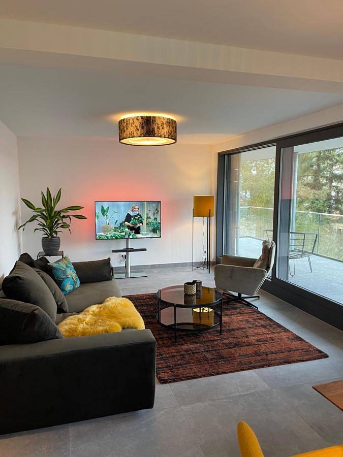 Ferienwohnung für 4 Personen, mit Balkon und Terrasse sowie Garten und Seeblick in Oranienburg