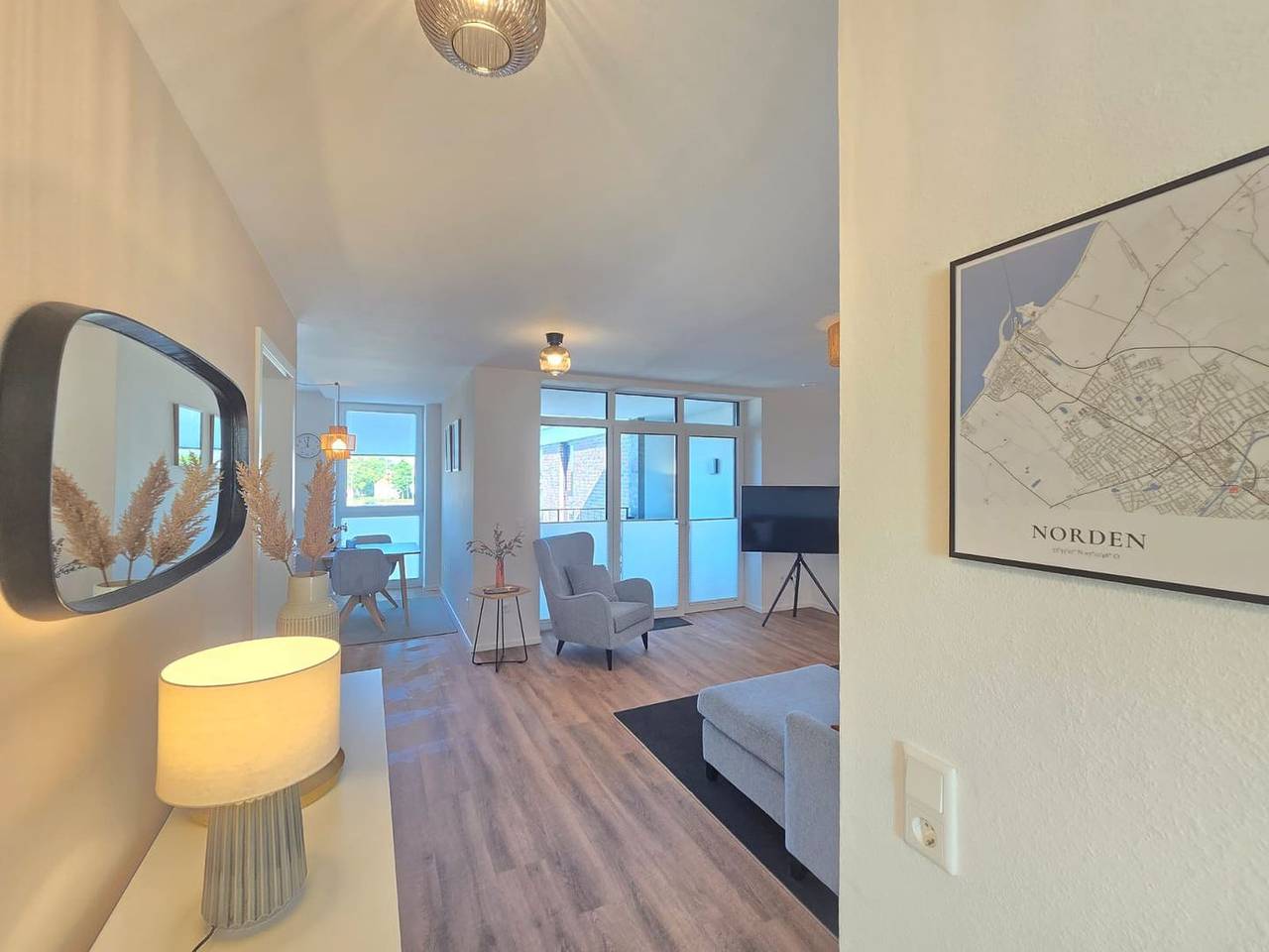 Ganze Wohnung, Modernes Ferienappartment Nordseenixe mit Sauna, Balkon und Meerblick in Norden in Norden, Norden und Umgebung