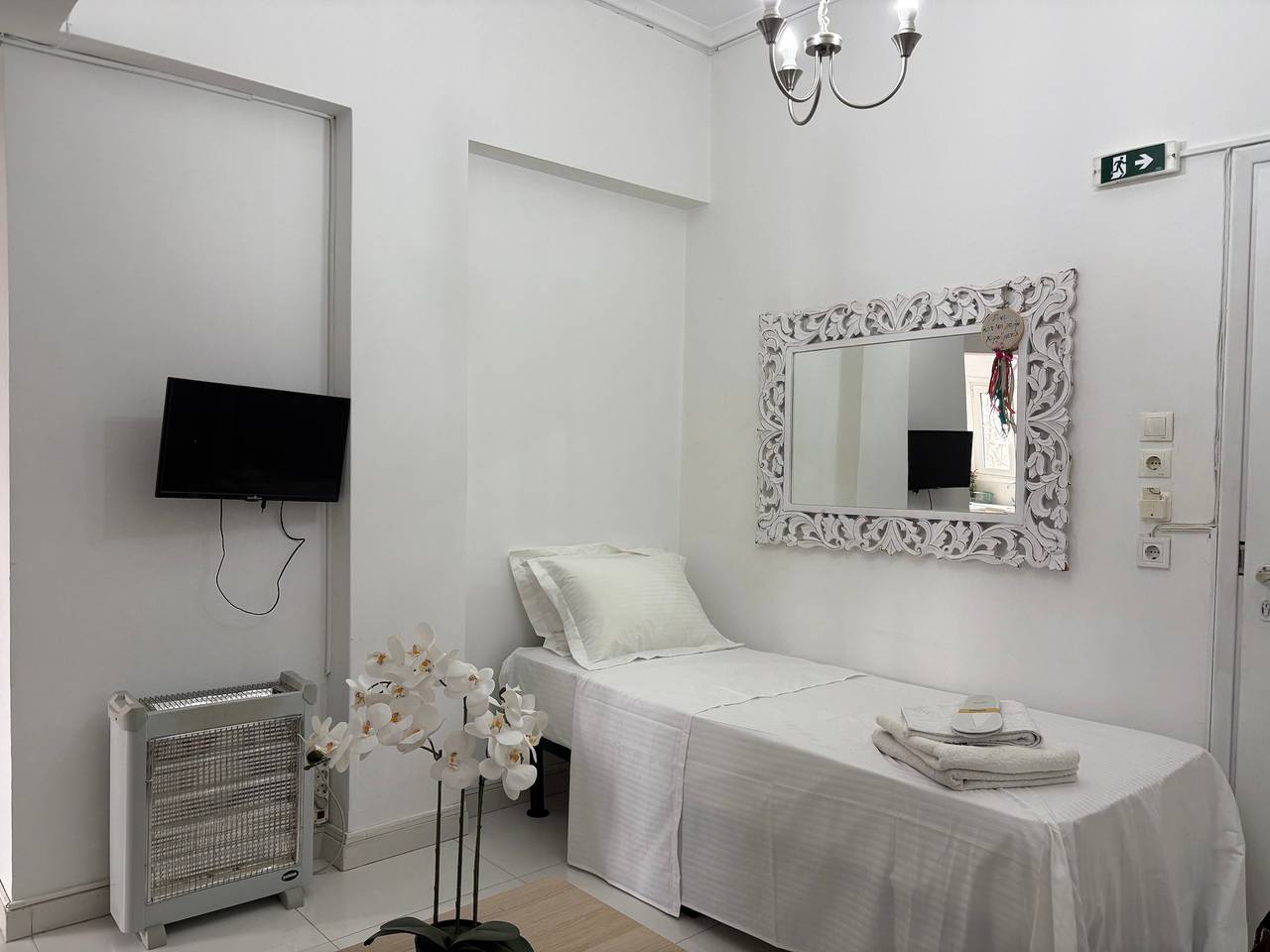 Appartement entier, Appartement 'Séjours Uniques à Athènes' avec terrasse partagée, Wi-Fi et climatisation in Athènes, Section sud d'Athènes