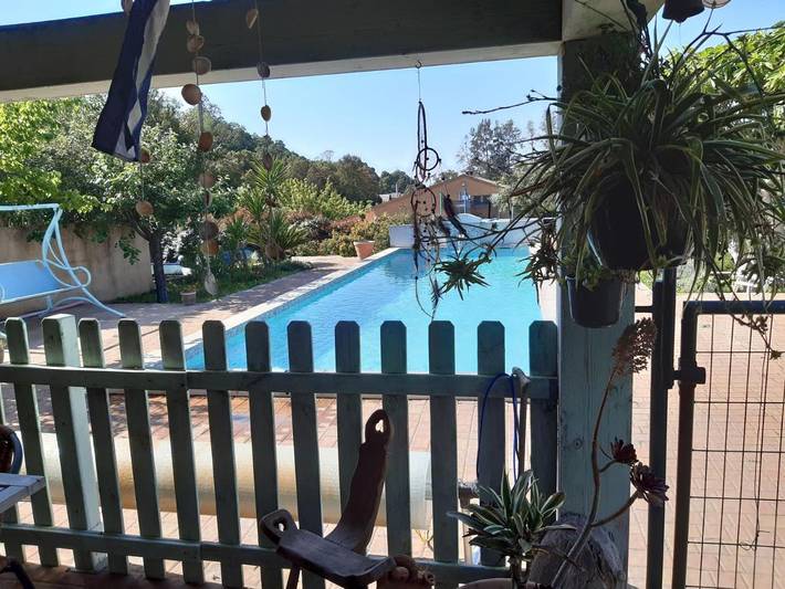 Appartement de vacances pour 4 personnes, avec piscine et jardin, adapté aux familles