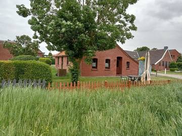 Ferienhaus für 2 Personen, mit Ausblick und Garten in Krummhörn
