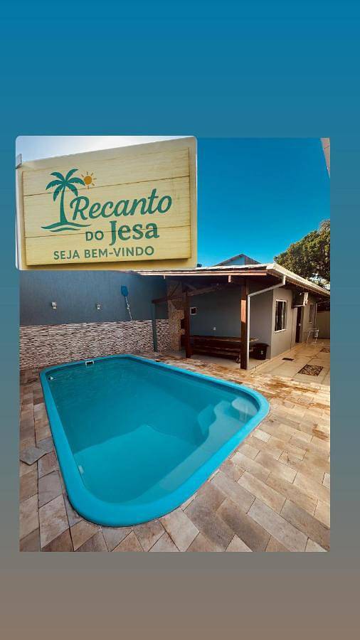 Casas e apartamentos de temporada para 5 pessoas, com piscina e jardim em Navegantes