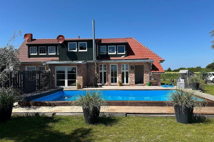 Ferienhaus für 4 Personen, mit Garten in Ostermarsch