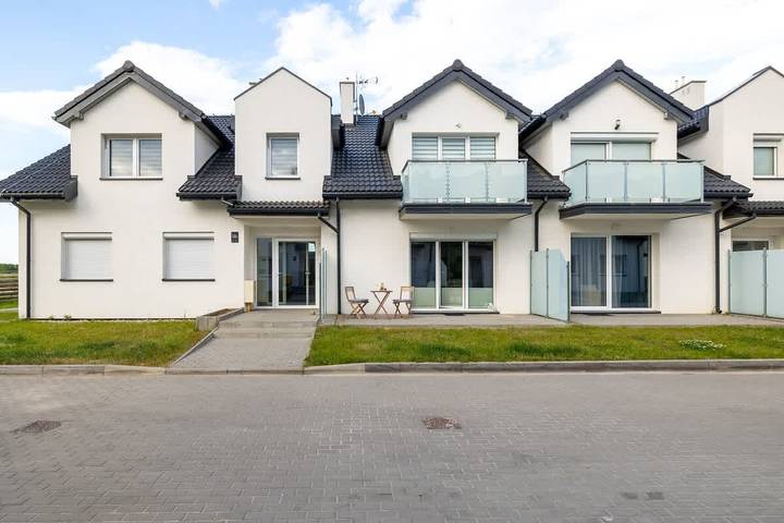 Ganze Ferienwohnung, Ferienwohnung für 2 Personen mit Garten in Darłowo, Powiat Sławieński