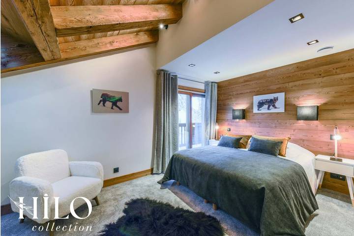Chalet pour 12 personnes, avec sauna ainsi que jardin et piscine dans Méribel