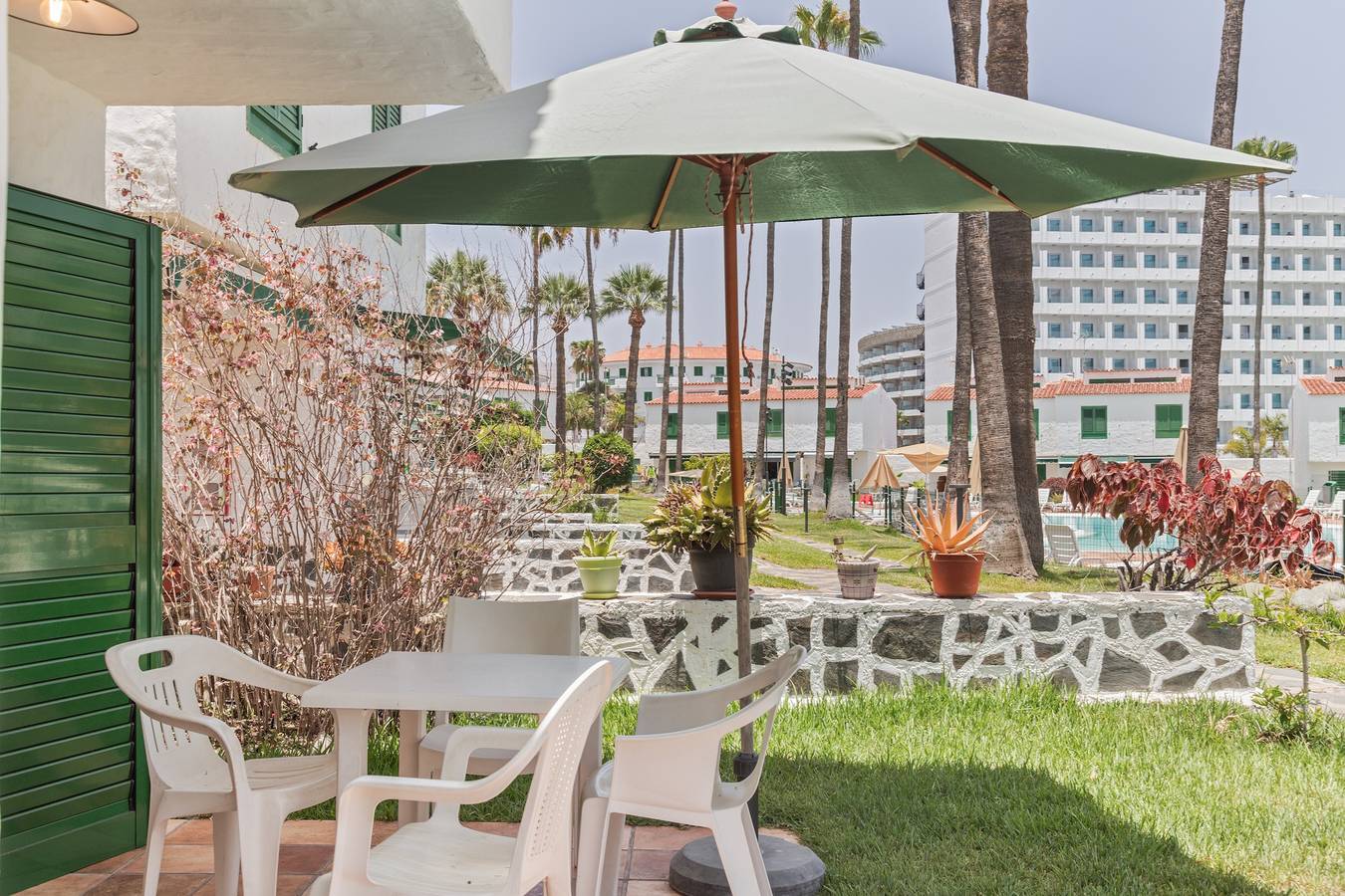 Entire apartment, Vacation at 'El Caserío De Merengue' with Shared Pool, Wi-Fi, and Air Conditioning in Maspalomas, San Bartolomé de Tirajana