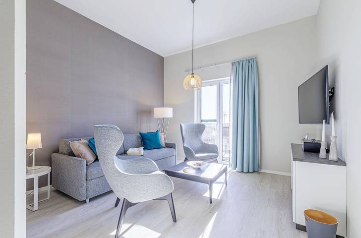 Ferienwohnung für 4 Personen, mit Seeblick und Balkon sowie Sauna, mit Haustier in Wustrow