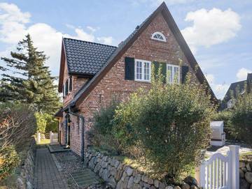 Ferienhaus für 4 Personen, mit Sauna und Terrasse sowie Garten in Wenningstedt