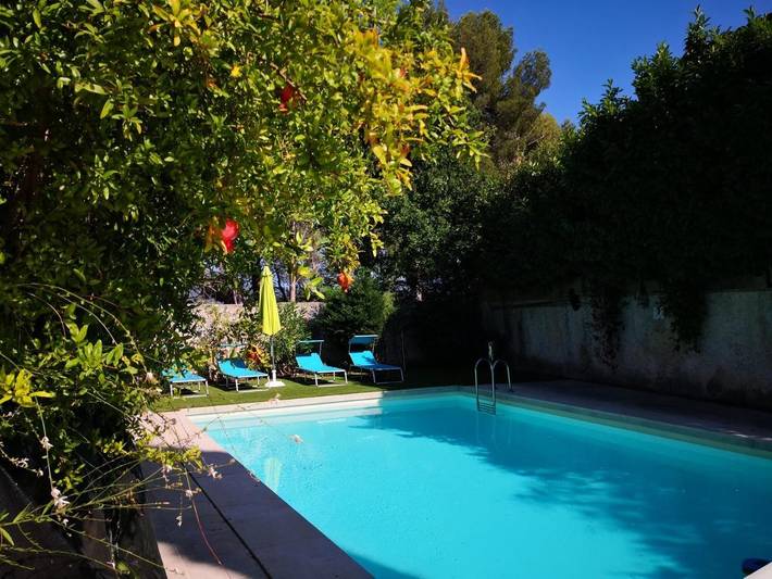 Appartement de vacances pour 4 personnes, avec Balcon et Terrasse ainsi que Jardin et Piscine