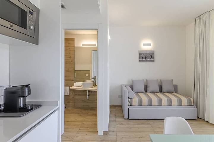 Apartamento entero, Elegante apartamento cerca de la playa de La Pelosa in Spiaggia La Pelosa, Stintino