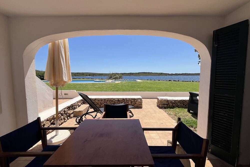 Entire apartment, Very front line stunning sea views near the beach in Fornells, Es Mercadal