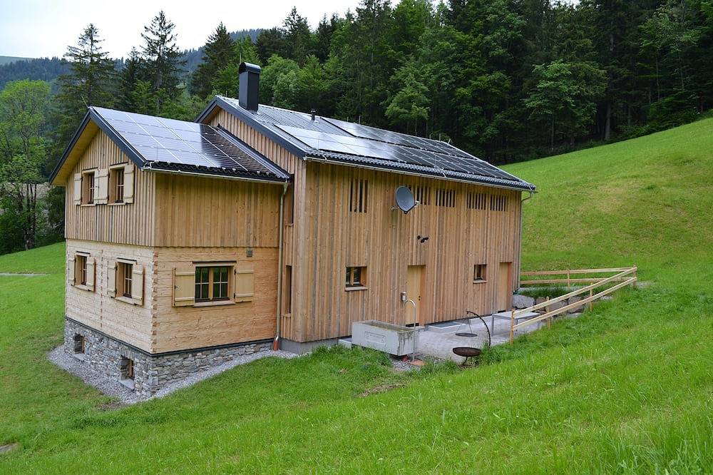 Modern vacation hut in a quiet, secluded location at the foot of the Hirschberg, with terrace in Bizau, Bregenz Forest