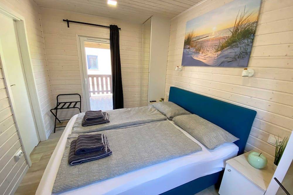 Wassermann vacation home with box-spring beds and large terrace in Wunstorf, Steinhuder Meer