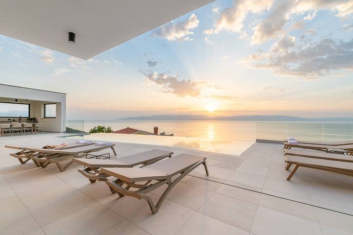 Ferienhaus für 8 Personen, mit Sauna und Meerblick sowie Pool und Garten