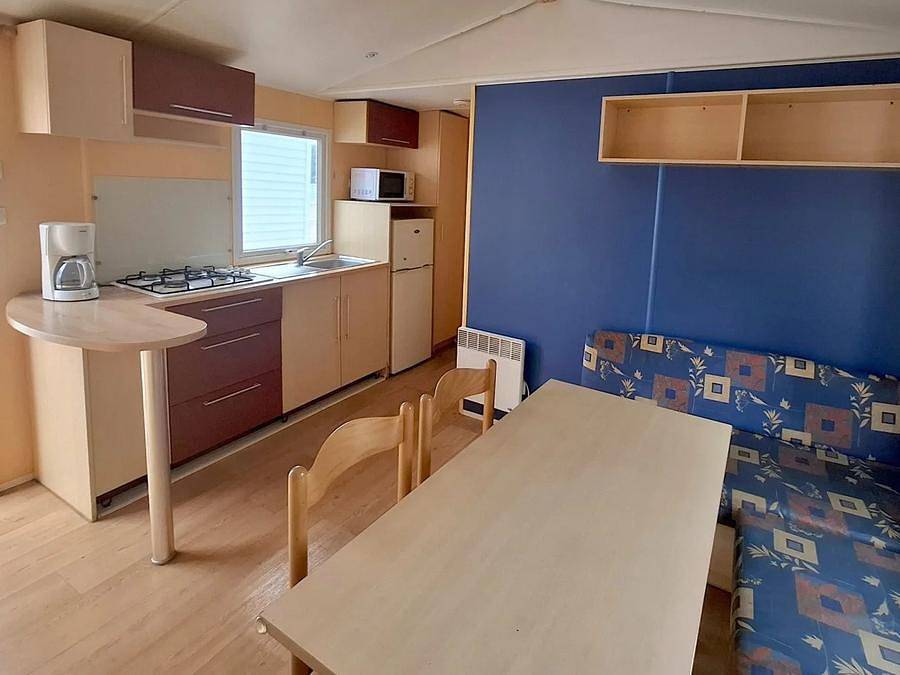 Camping L'Ile Verte - Stacaravan 4 personen - Klassieke" stacaravan - 4 + 1 slaapplaatsen in Genouillé, Rochefort en omgeving