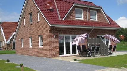 Ferienhaus für 4 Personen, mit Garten und Seeblick sowie Terrasse, kinderfreundlich in Landkreis Aurich