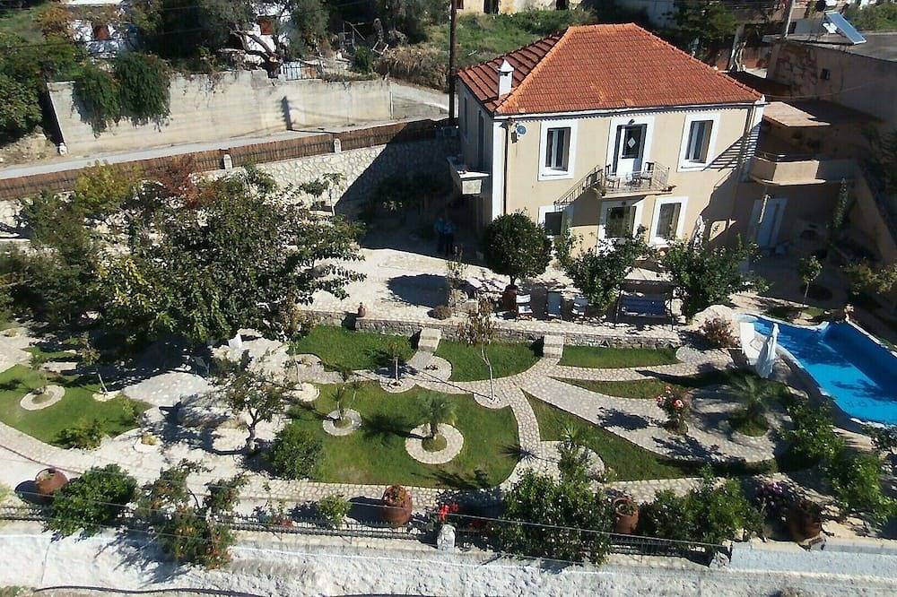 Prive-paradijs met verwarmd zwembad, prachtig uitzicht en grote tuin in Iraklio-Heraklion en omgeving