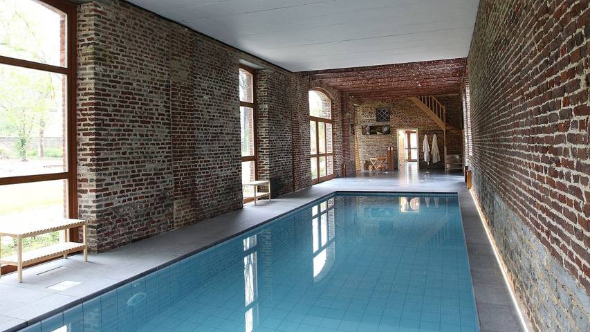 Appartement de vacances pour 40 personnes, avec piscine et terrasse ainsi que jardin et sauna