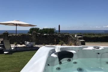 Cottage pour 13 personnes, avec jardin et sauna ainsi que jacuzzi et piscine dans Abbaye de la Pointe Saint-Mathieu