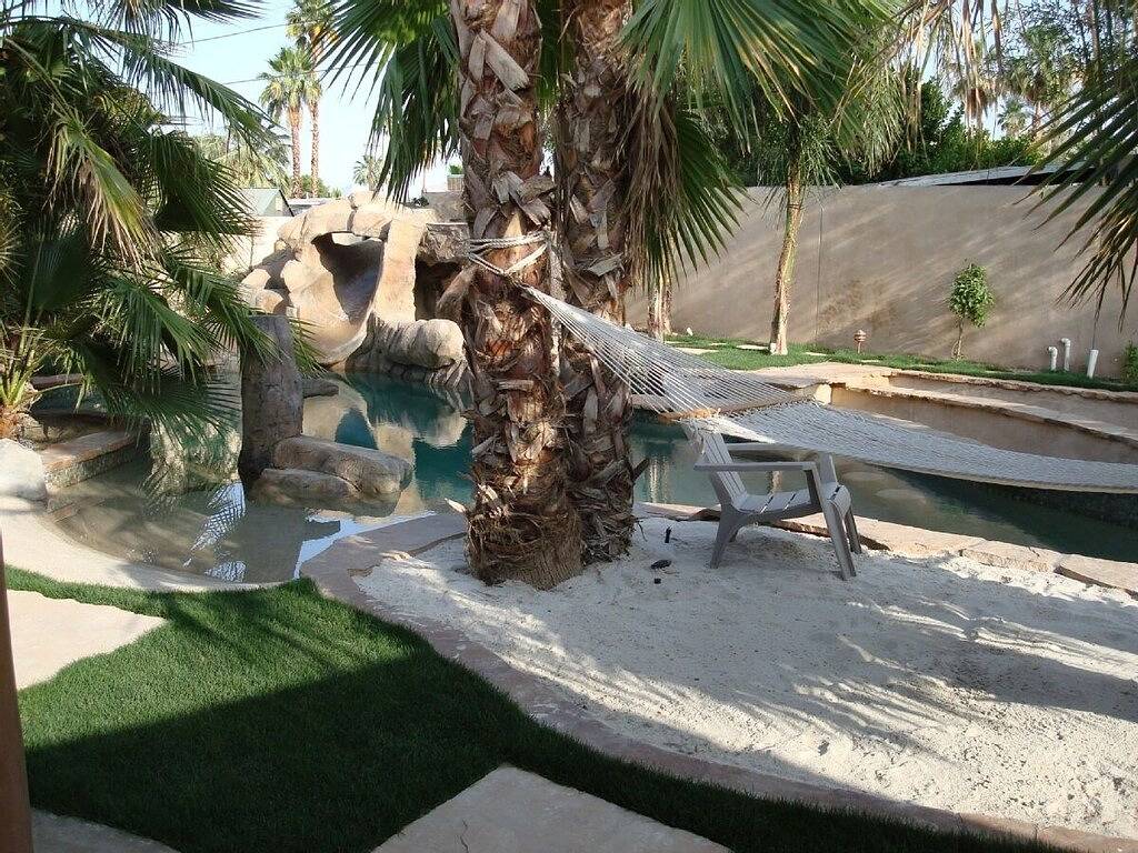 Mini Resort!! Swim up bar! Beach Entry! Spa in a Cave & Slide & More! in Palm Springs, Coachella Valley