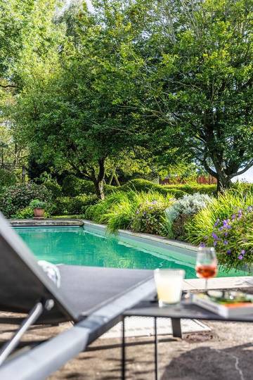 Gîte pour 8 personnes, avec jardin et piscine ainsi que vue et sauna à Ohey