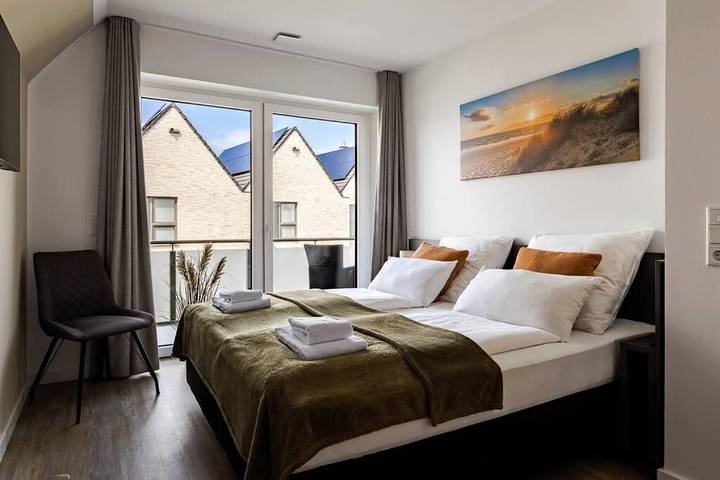 Ferienwohnung für 6 Personen, mit Balkon und Terrasse sowie Garten und Sauna in Büsum