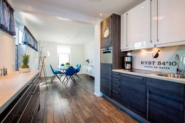 Ferienhaus für 4 Personen, mit Terrasse und Ausblick sowie Sauna in Neustadt in Holstein