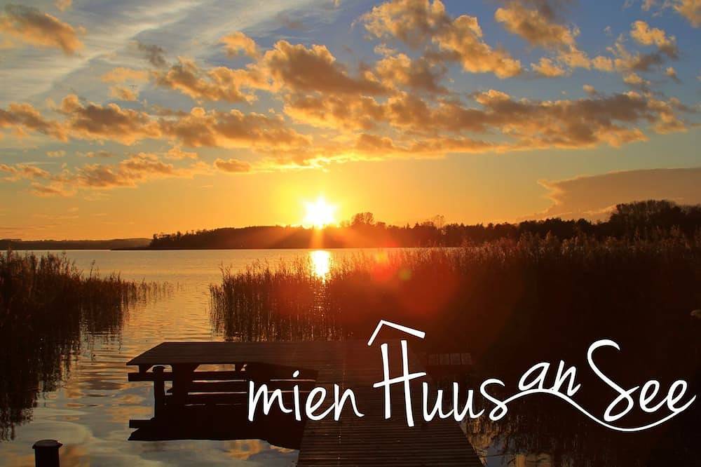Ferienhaus \"Mien Huus an See\" mit Seezugang Bootssteg und Bademöglichkeit in Güstrow, Mecklenburgische Seenplatte