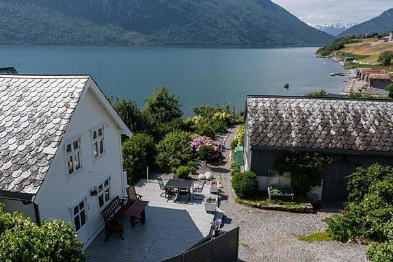 Ferienhaus für 8 Personen, mit Ausblick und Garten sowie Sauna und Seeblick, mit Haustier