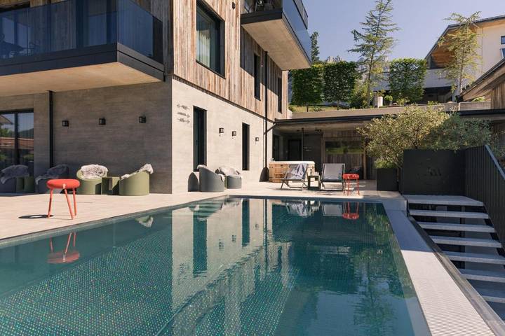Ferienhaus für 3 Personen, mit Terrasse und Ausblick sowie Sauna und Pool, mit Haustier in Going am Wilden Kaiser