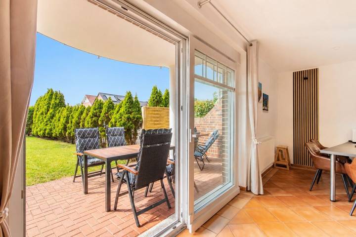 Ganze Wohnung, Südoase - Moderne Ferienwohnung mit Terrasse & Garten in ruhiger Lage in Borkum
