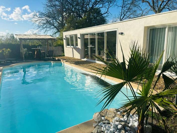 Appartement de vacances pour 2 personnes, avec terrasse et piscine ainsi que jardin et jacuzzi
