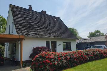 Ferienhaus für 6 Personen, mit Terrasse und Garten in Uplengen