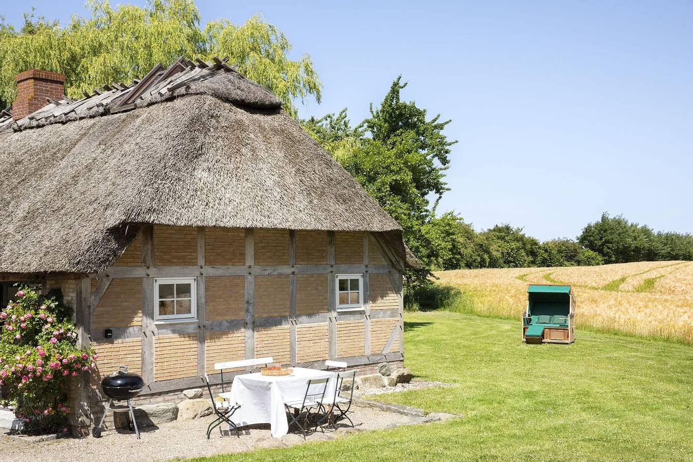 Urgemütliche Reetdachkate mit großem Kamin und Sauna in Geltinger Birk, Pommerby