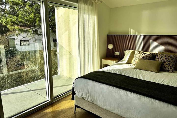 Appartement entier, Grand appartement vue mer avec piscine et couchers de soleil in Cangas, Rías Baixas