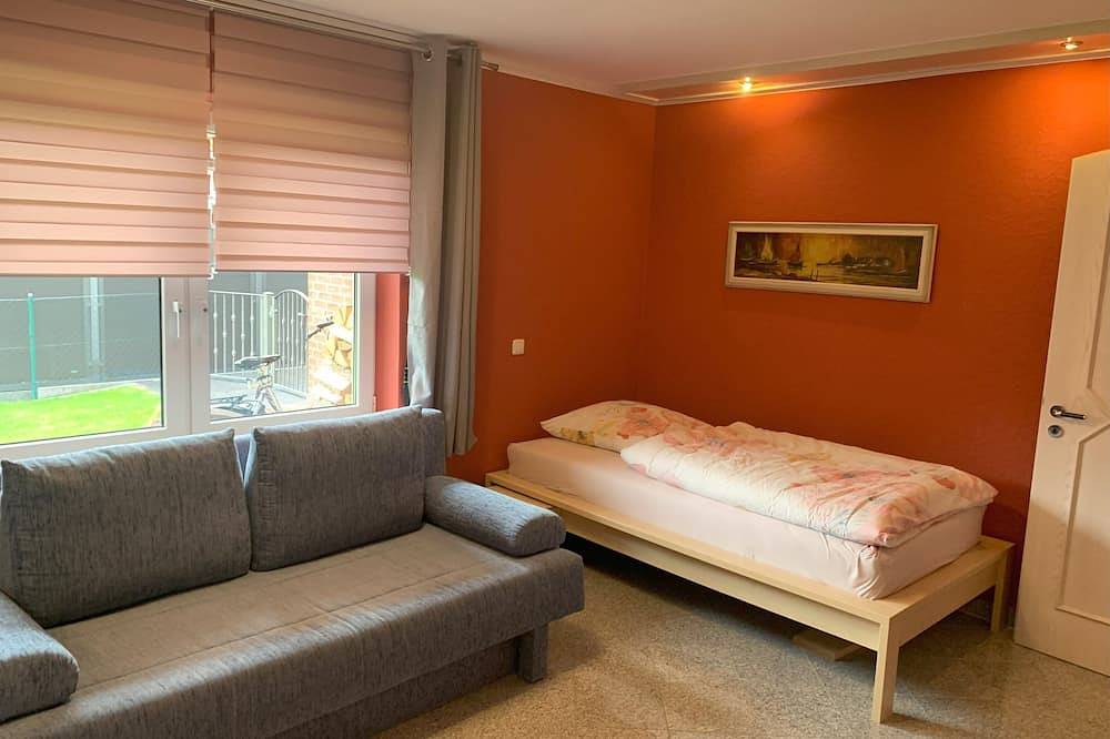 Ferienhaus Wesergarten mit Kamin, großem Garten und gepflegtem Fischteich in Rinteln, Landkreis Schaumburg