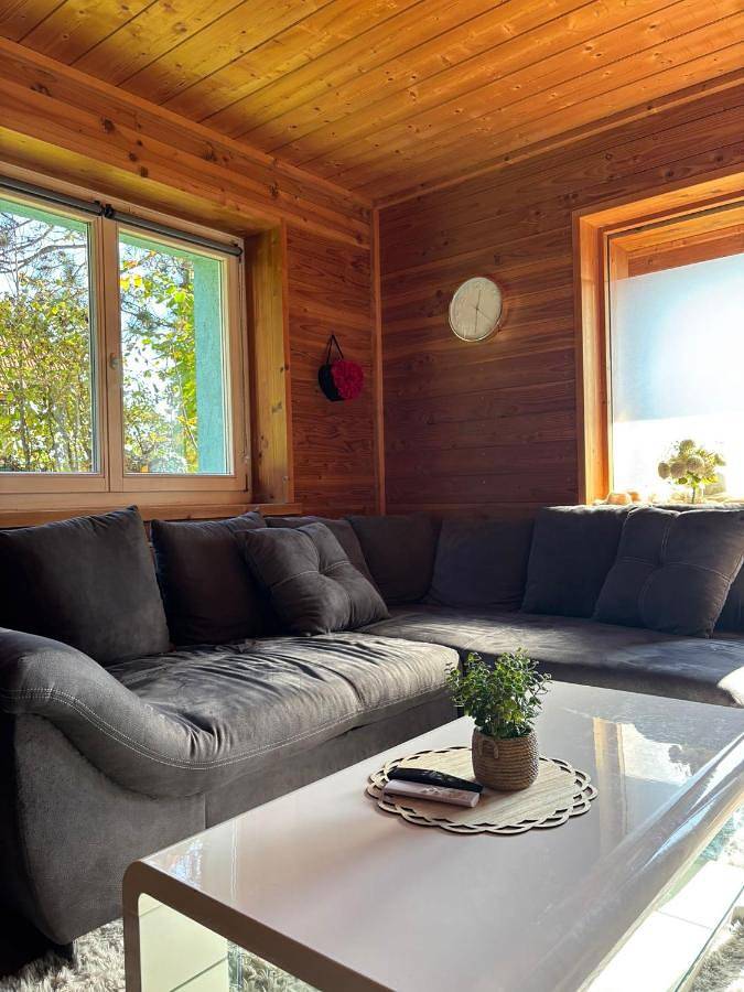 Ferienwohnung für 4 Personen, mit Terrasse und Garten sowie Ausblick in Weilheim