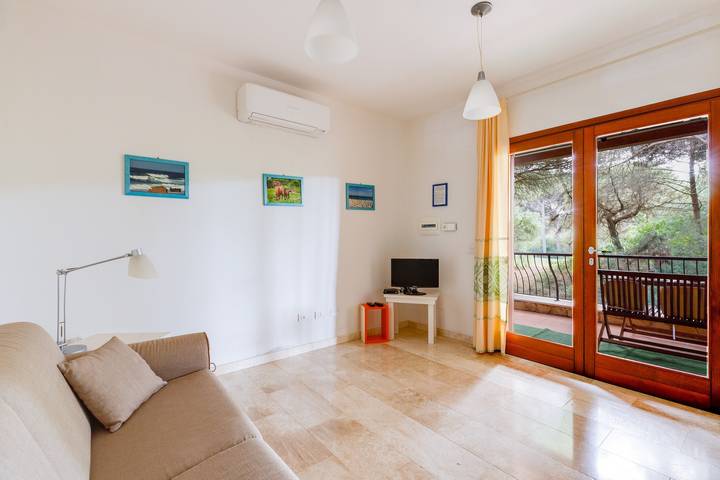 Casa vacanze "Antonella Sul Golf" con piscina condivisa, terrazza privata e Wi-Fi in Is Arenas, Narbolia