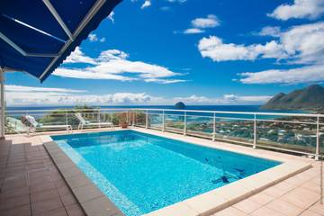 Location de vacances pour 7 personnes, avec piscine et balcon à Le Diamant