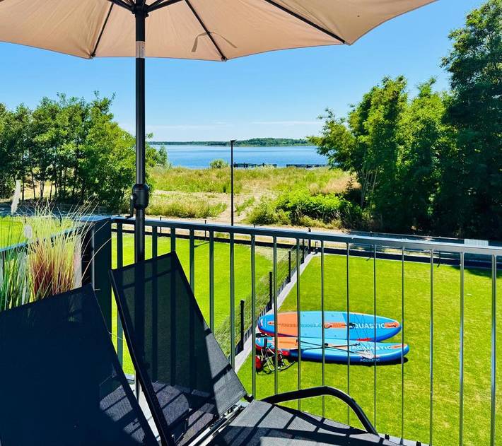 Ferienhaus für 8 Personen, mit Balkon und Whirlpool sowie Terrasse und Garten in Muldestausee