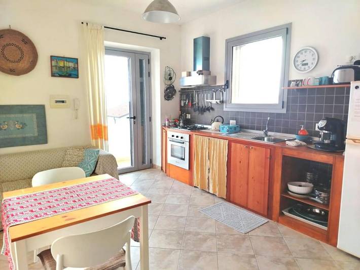 Appartamento per 2 persone, con panorama e terrazza in Fertilia