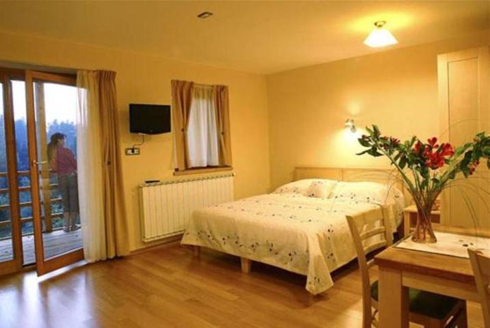 Appartement de vacances pour 2 personnes, avec jardin ainsi que sauna et vue