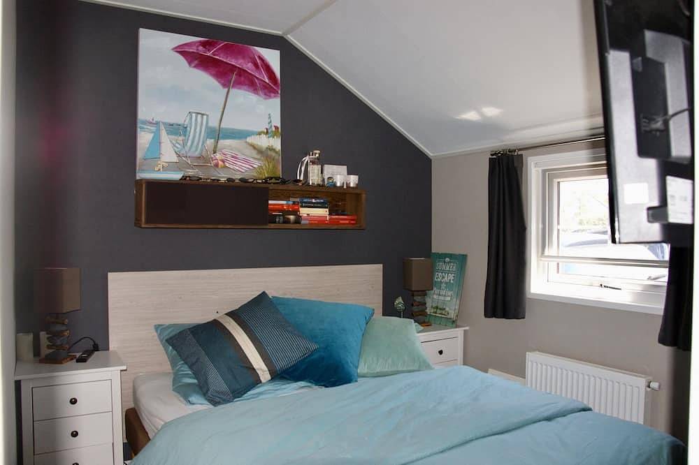 Chalet moderno en Renesse en el camping Julianahoeve, a 300 metros de la playa. in Playa de Renesse, Renesse