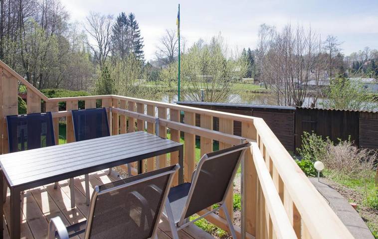 Ferienwohnung für 4 Personen, mit Balkon und Garten sowie Ausblick und Seeblick